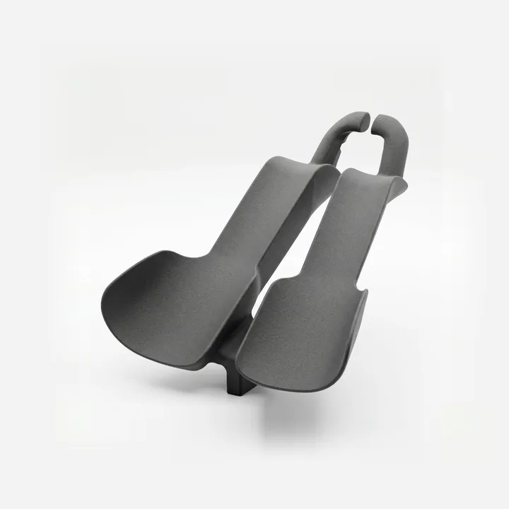 Time-trial bar with two arm rests and grips, 3D-printed in grey by Multi Jet Fusion