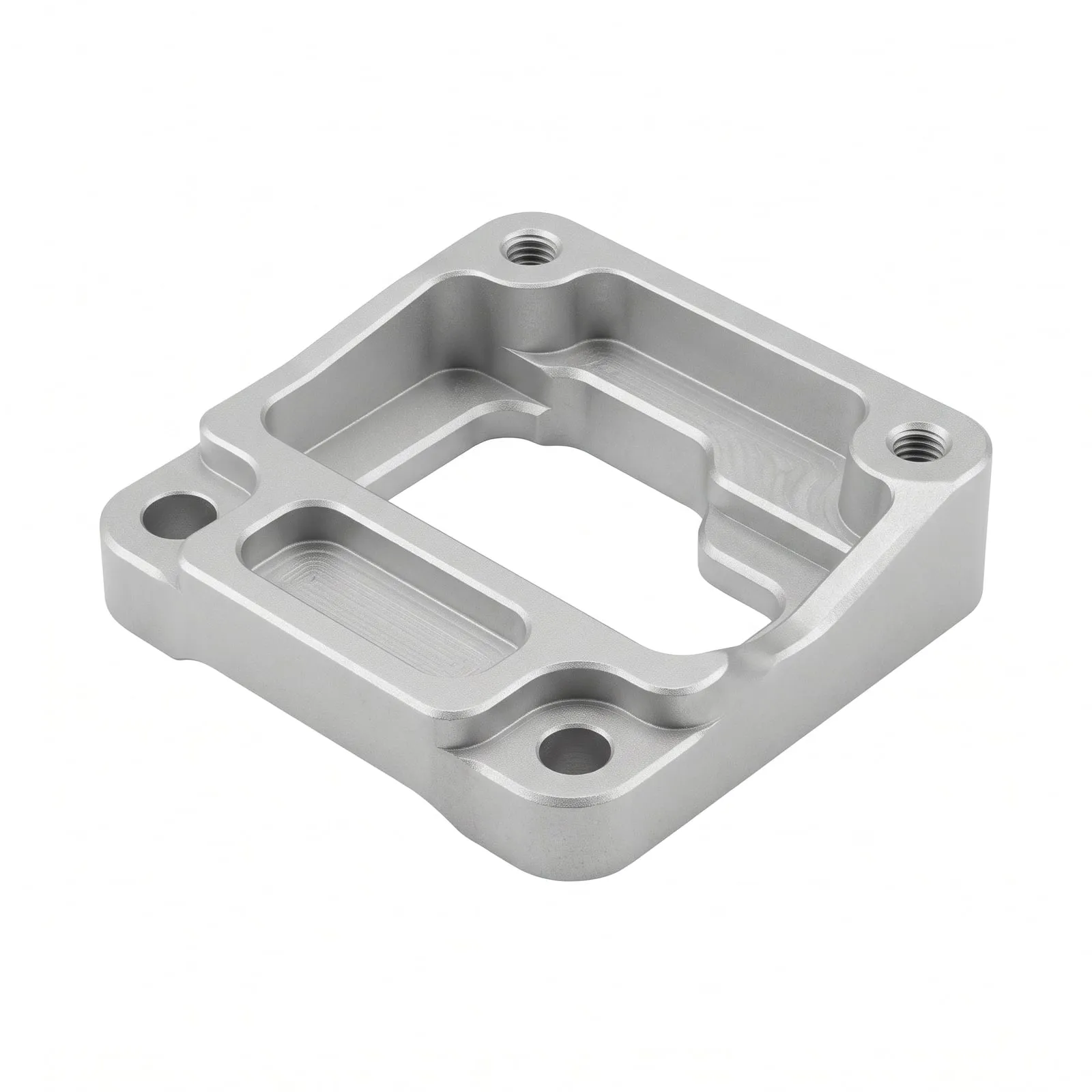An aluminum spacer frame, CNC milled with pockets and tapped holes, bead-blasted